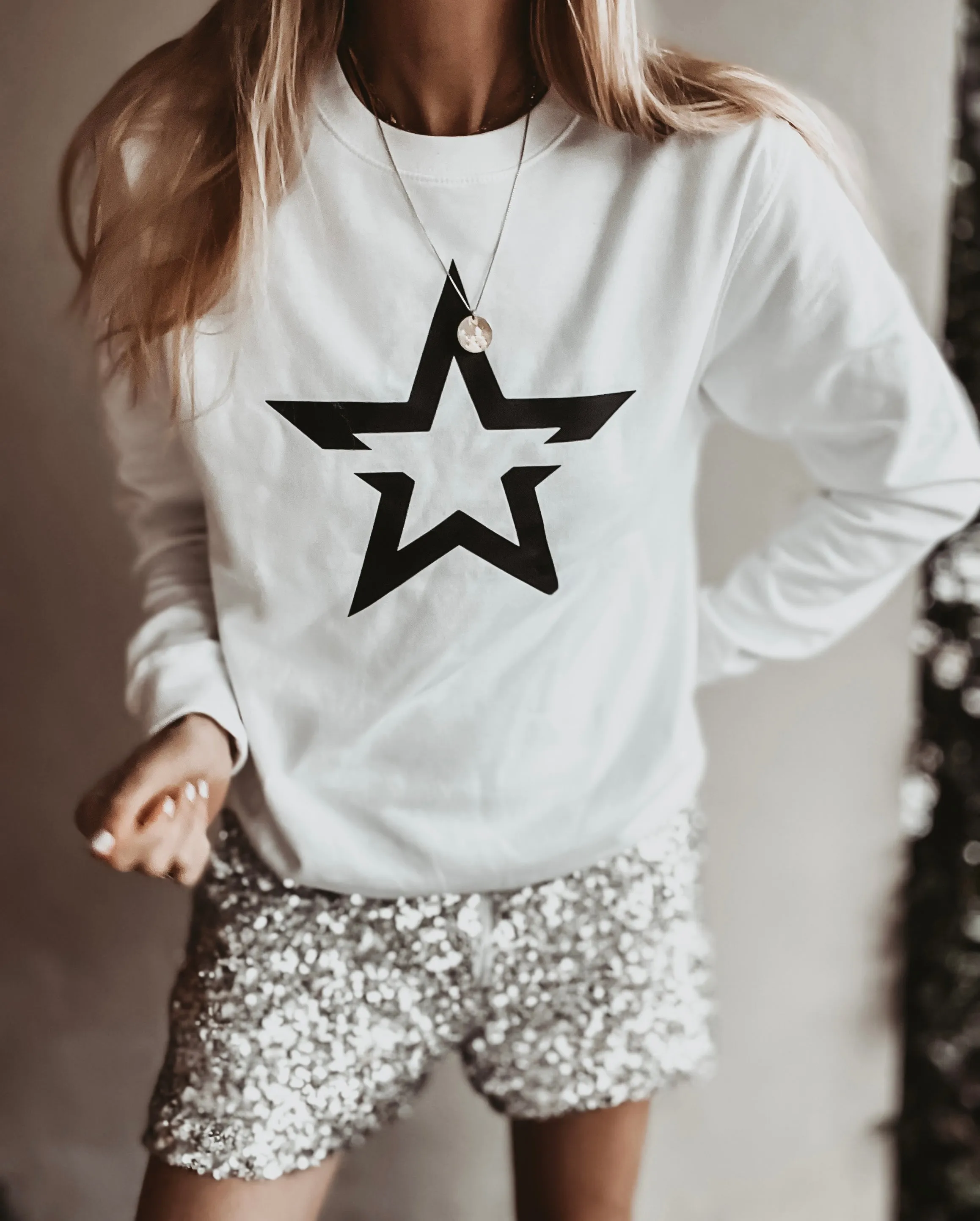 White sweatshirt with a striking black star *boyfriend fit*
